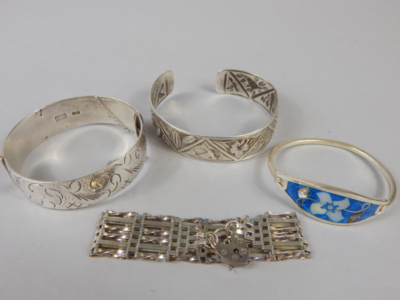 Appraisal: Various silver and white metal bracelets to include a hinged