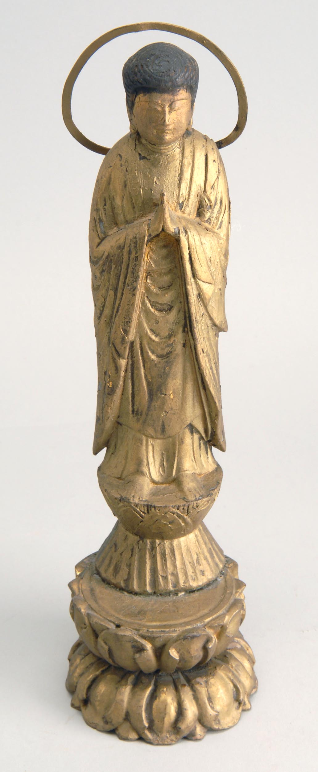 Appraisal: GOLD LACQUER-ON-WOOD FIGURE OF BUDDHA th CenturyIn standing position on