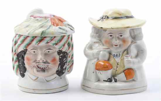 Appraisal: Two Staffordshire Ceramic Figural Tobacco Jars the first full figured