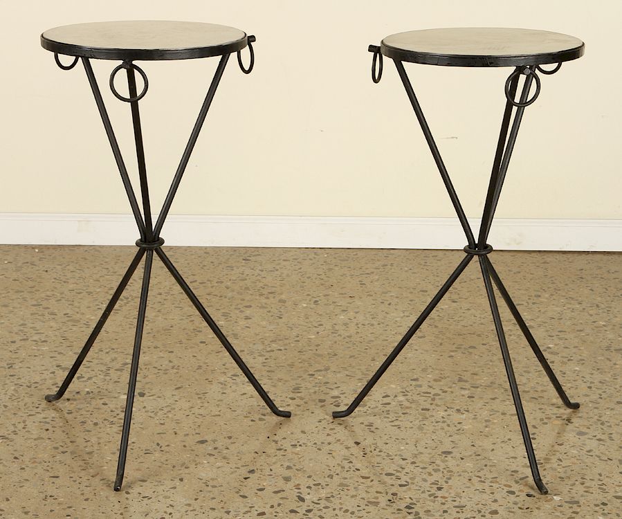 Appraisal: PAIR IRON DRINKS TABLES MANNER JEAN-MICHEL FRANK A pair of