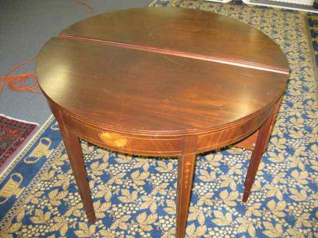 Appraisal: Mahogany Banquet Table pair of demilunestyle banded and string inlay