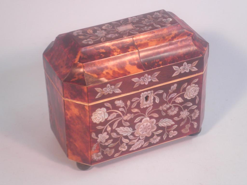 Appraisal: An early thC tortoiseshell mother-of-pearl inlaid tea caddy the sarcophagus