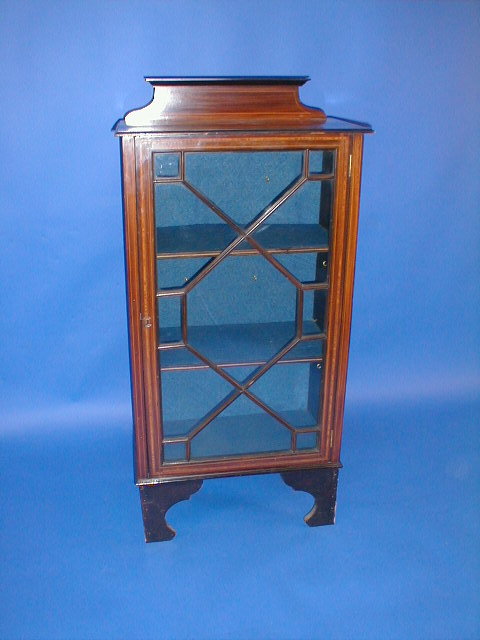 Appraisal: An Edwardian string inlaid mahogany display cabinet with single astragal