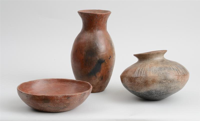 Appraisal: THREE PRE-COLUMBIAN STYLE POTTERY ARTICLES Comprising an ovoid vase with