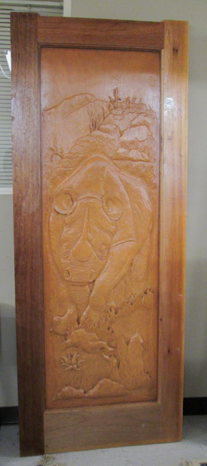 Appraisal: PICTORIAL CARVED TEAKWOOD ENTRY DOOR Doorcraft Ltd Bronkhorspruit South Africa