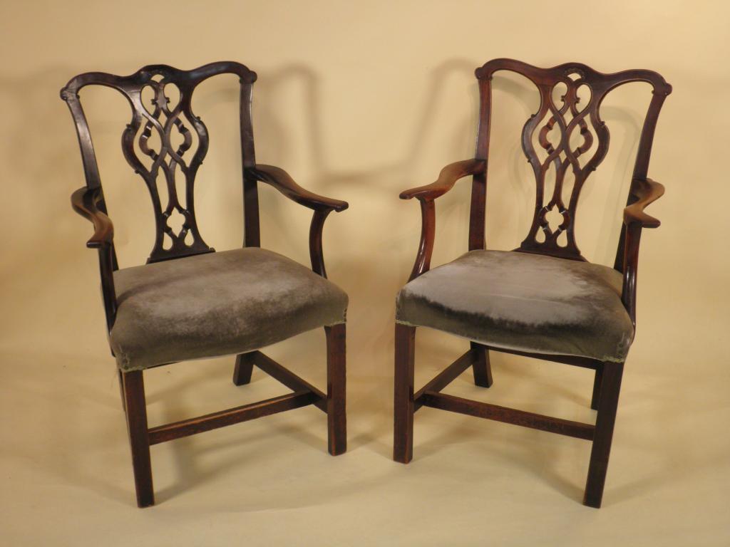 Appraisal: A pair of George III mahogany elbow chairs each with