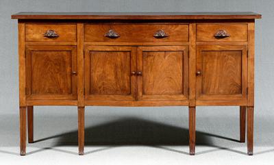 Appraisal: Cuban mahogany sideboard Regency style with serpentine front dovetailed drawers