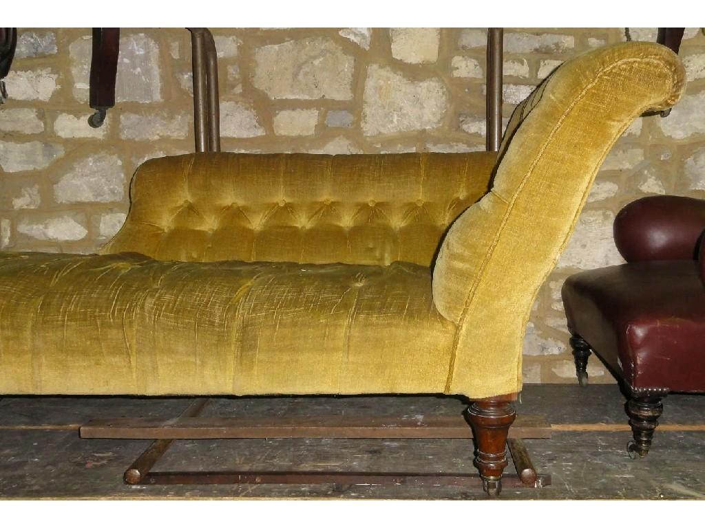 Appraisal: A Victorian chaise lounge with button upholstered seat and shaped