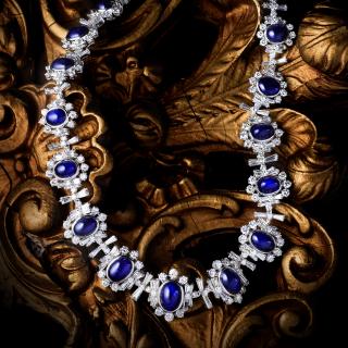 Appraisal: A Diamond and Sapphire Demi Comprising a necklace a pair