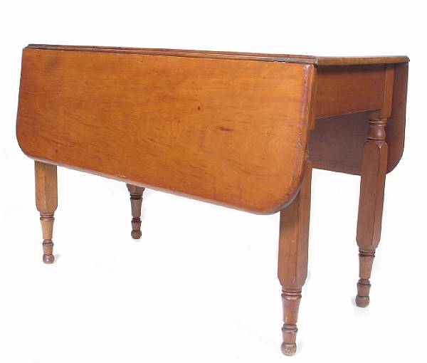 Appraisal: An American cherrywood drop leaf table height in width in