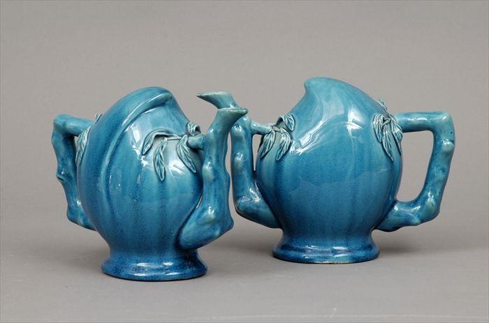 Appraisal: Pair of Chinese Turquoise-Glazed Porcelain Fruit-Form Puzzle Teapots x in