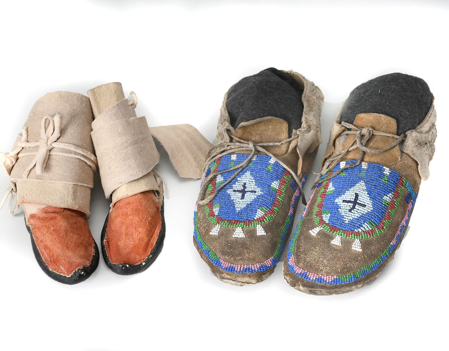 Appraisal: NATIVE AMERICAN NORTHERN PLAINS PUEBLO CHILDS MOCCASINS Northern plains moccasins