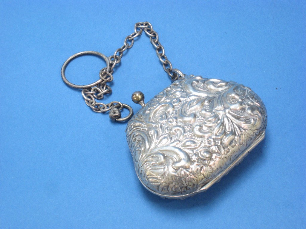 Appraisal: An Edward VII Purse with floral and scroll embossing and