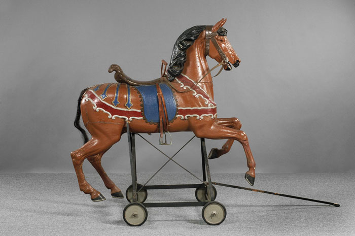 Appraisal: FULL-BODIED POLYCHROME PAINTED CARVED PINE CAROUSEL HORSE NOW ON WROUGHT