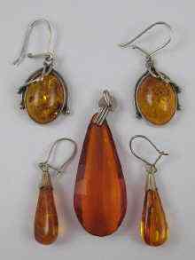 Appraisal: An amber pendant approx cm in length with amber earrings