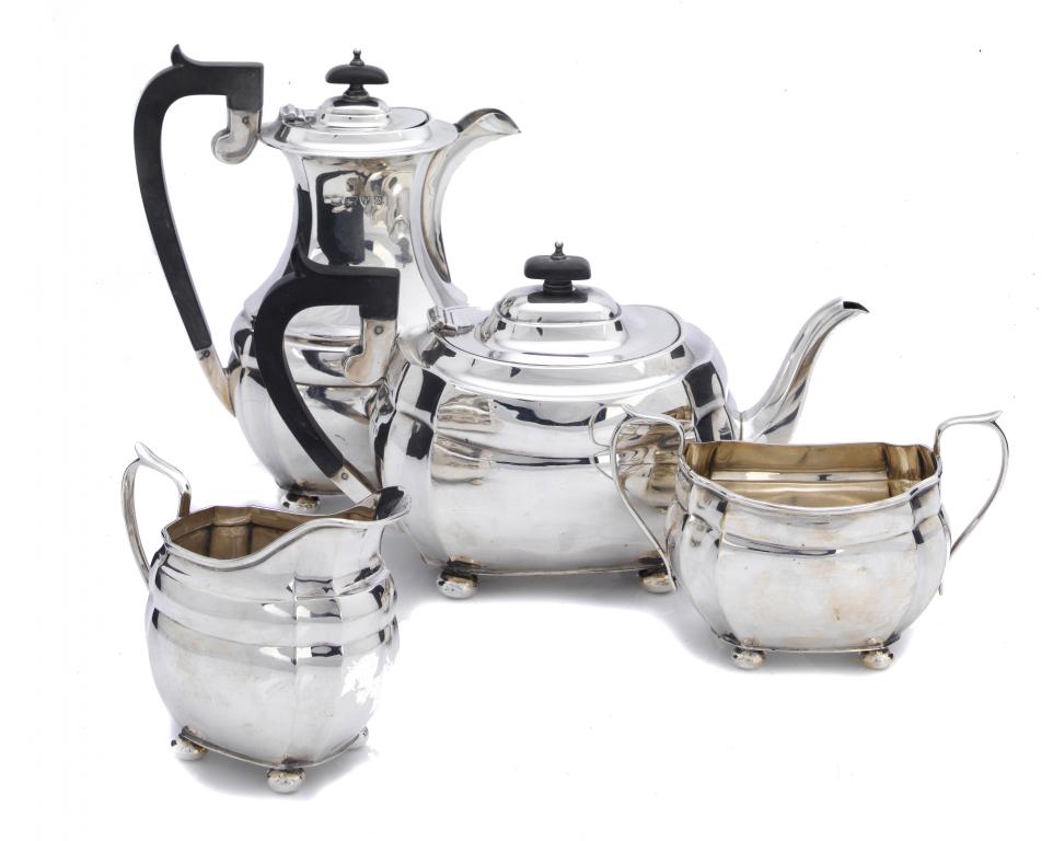 Appraisal: A GEORGE VI FOUR-PIECE TEA SERVICE of oblong form with