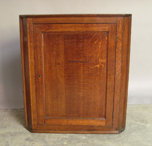 Appraisal: English oak corner cupboard th c h l