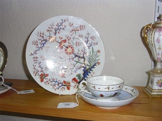 Appraisal: A TH CENTURY DERBY CUP AND SAUCER painted with flower