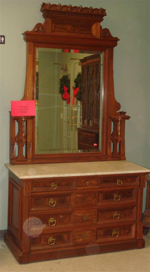 Appraisal: Carved walnut Eastlake MT dresser beveled glass mirror good original