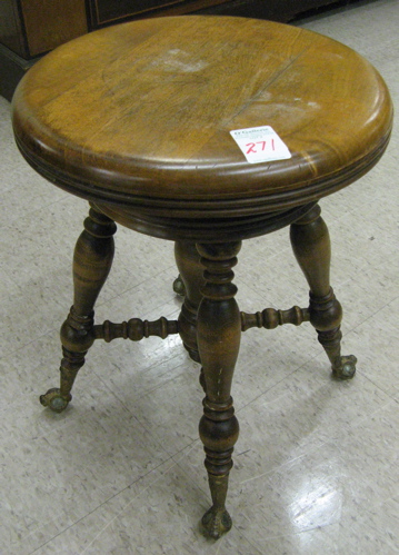 Appraisal: LATE VICTORIAN PIANO STOOL having a circular revolving adjustable seat