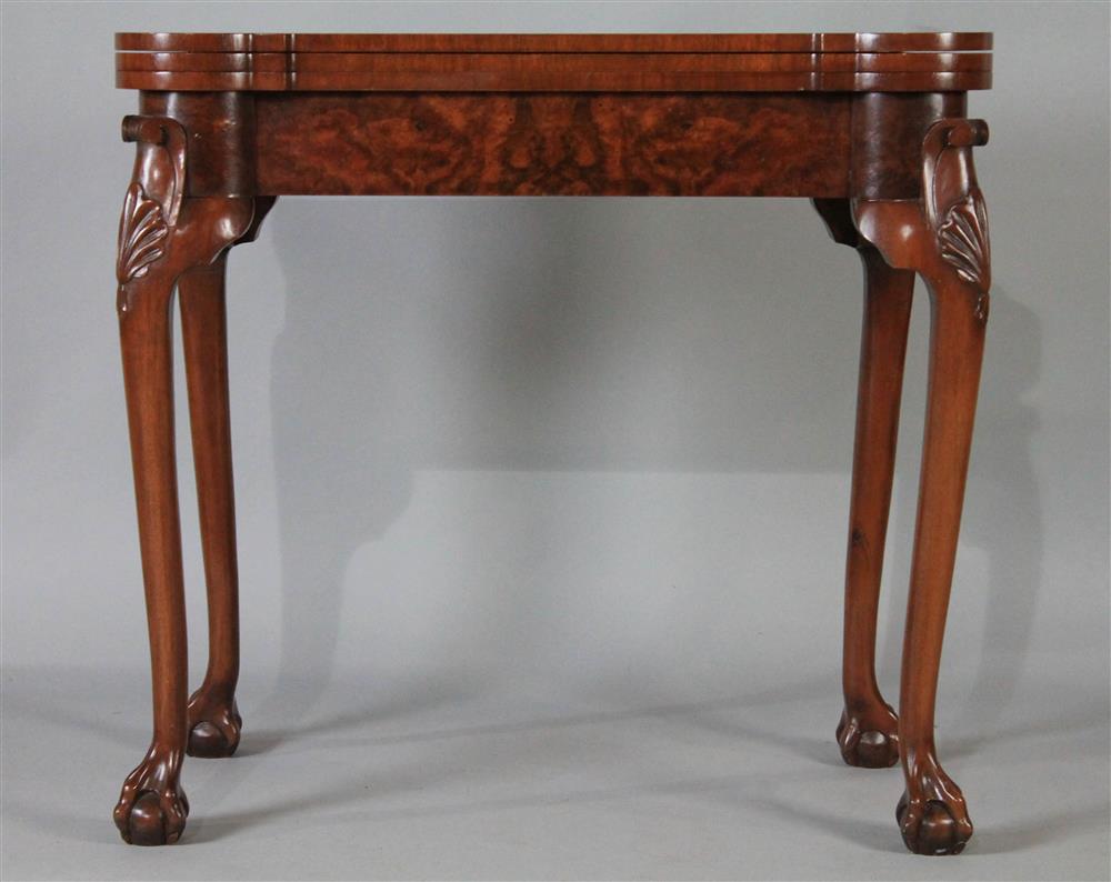 Appraisal: CHIPPENDALE STYLE CARVED WALNUT TRIPLE TOP GAMES TABLE having a