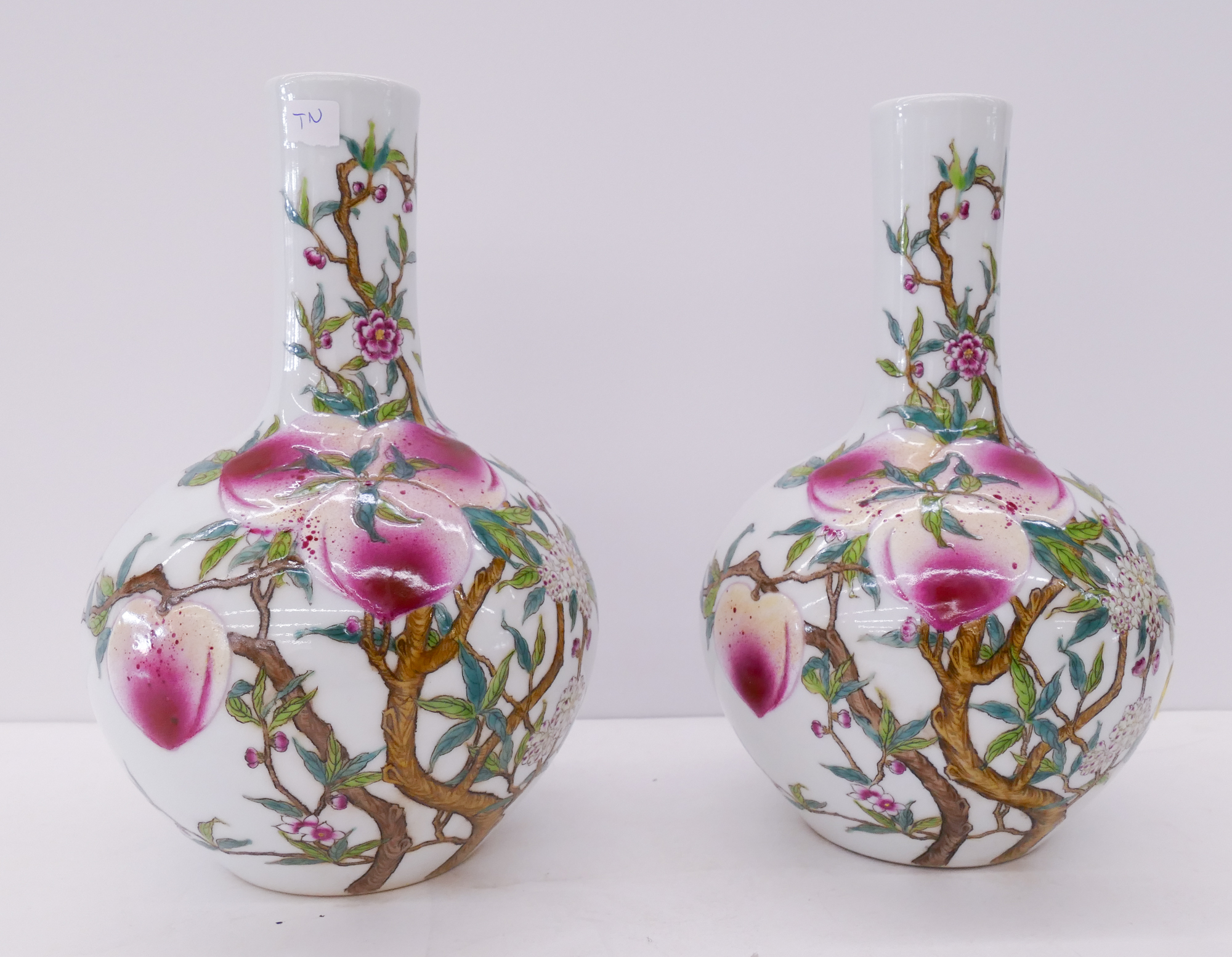 Appraisal: Pair Chinese Peach Porcelain Bottle Vases- ''