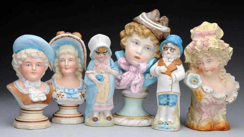 Appraisal: Lot of German Bisque Figures Boy and girl pair of