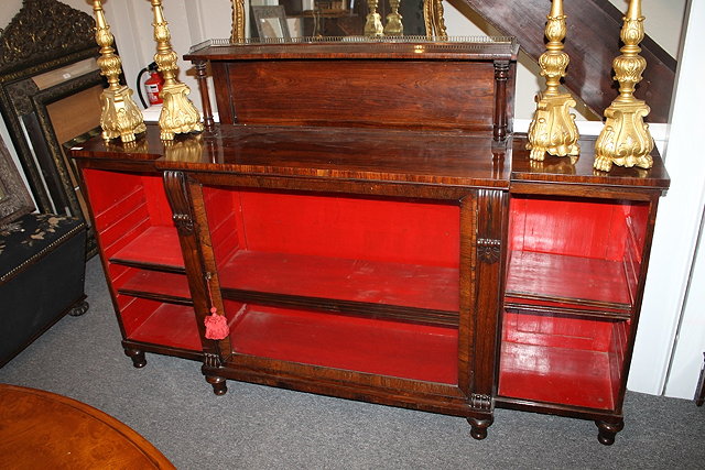 Appraisal: A TH CENTURY BREAKFRONT ROSEWOOD SIDE CABINET with raised gallery