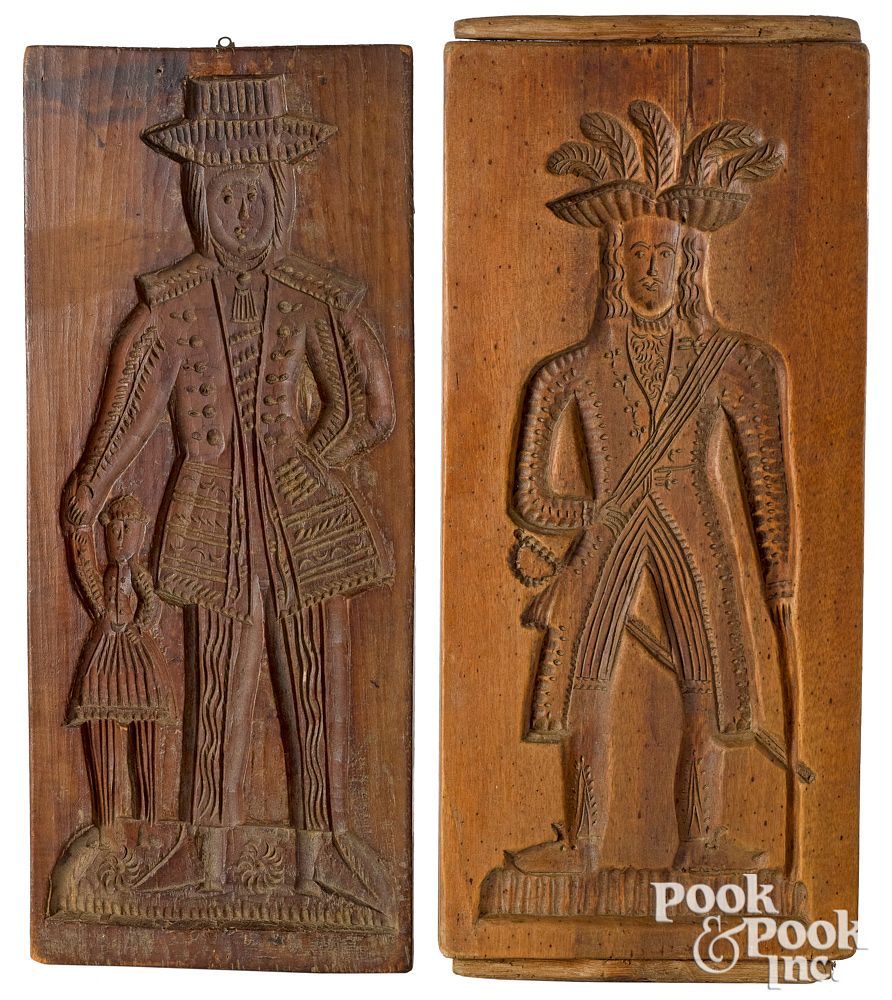 Appraisal: Two Dutch carved cakeboards th c with double Two Dutch