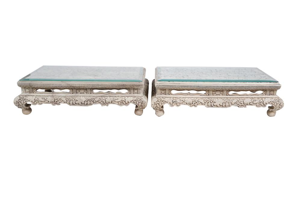 Appraisal: PAIR OF CHINOISERIE MOLDED LOW TABLESCondition chips to glass tops