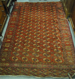 Appraisal: An antique Turkoman carpet the field with five rows of