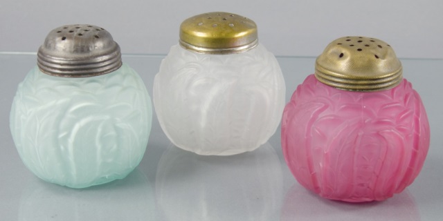 Appraisal: Three Leaf-Mold Sugar ShakersAll three in satin glass One in