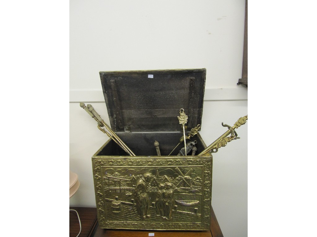 Appraisal: Assorted brass fire irons in a brass coal box