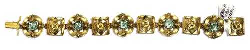 Appraisal: GOLD AND TOURMALINE BRACELET Yellow gold Fancy bracelet of round