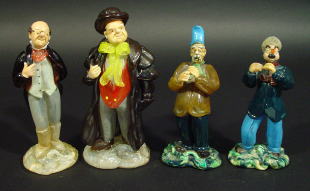 Appraisal: Four Czechoslovakian hand blown glass figures two modelled as Dickens