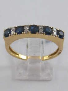 Appraisal: A yellow metal tests carat gold diamond and sapphire ring