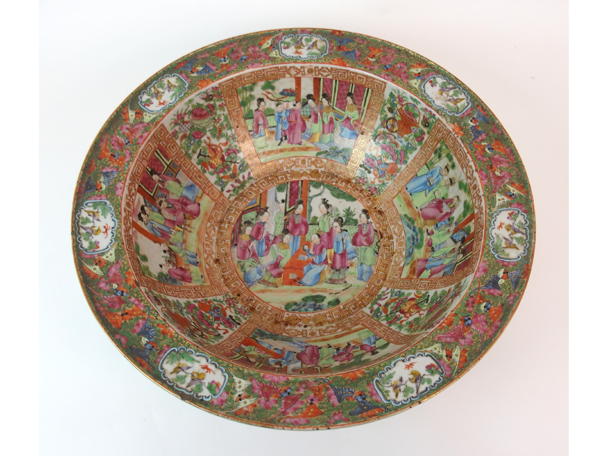 Appraisal: A Cantonese famille rose basinpainted with panels of figures on