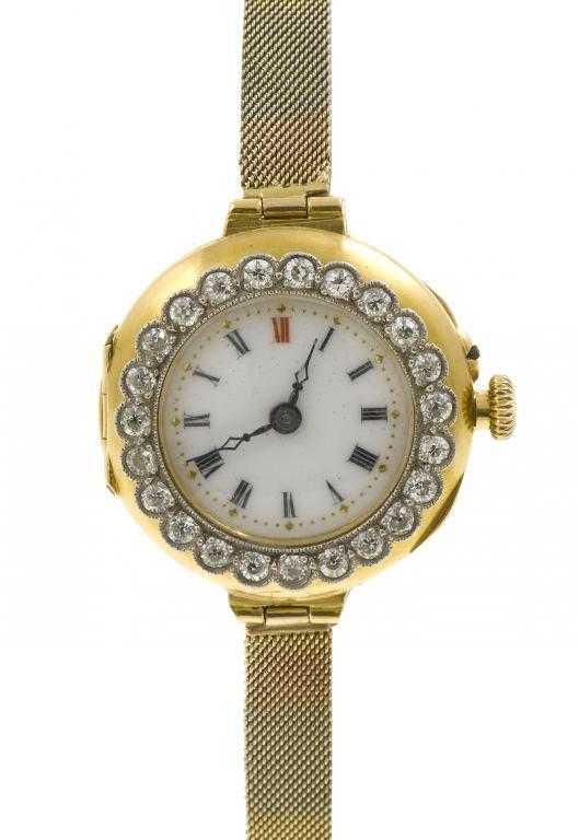 Appraisal: A SWISS CT GOLD LADY'S WRISTWATCH with enamel dial with