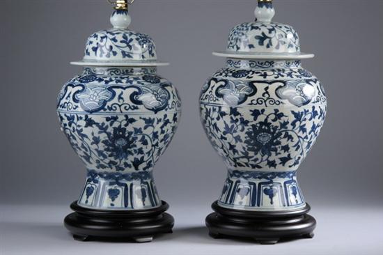 Appraisal: PAIR CHINESE BLUE AND WHITE PORCELAIN VASES AND COVERS Floral