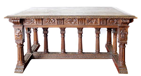 Appraisal: A Renaissance Revival carved oak library table late th century