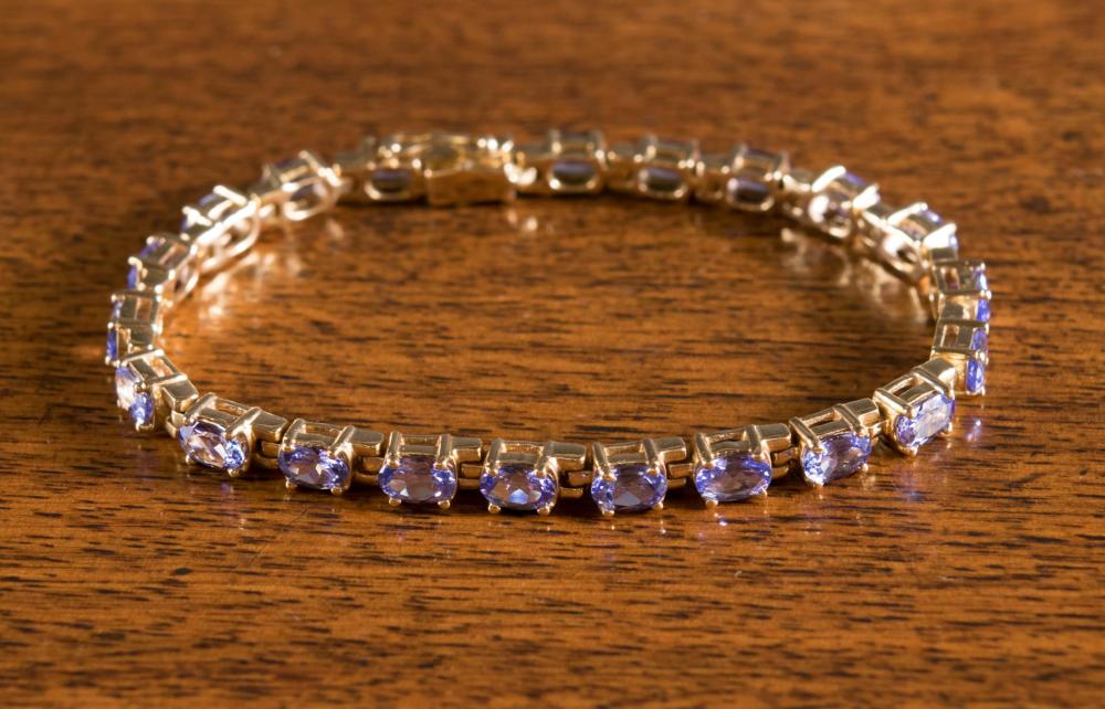 Appraisal: TANZANITE AND FOURTEEN KARAT GOLD TENNIS BRACELET WITH APPRAISAL The