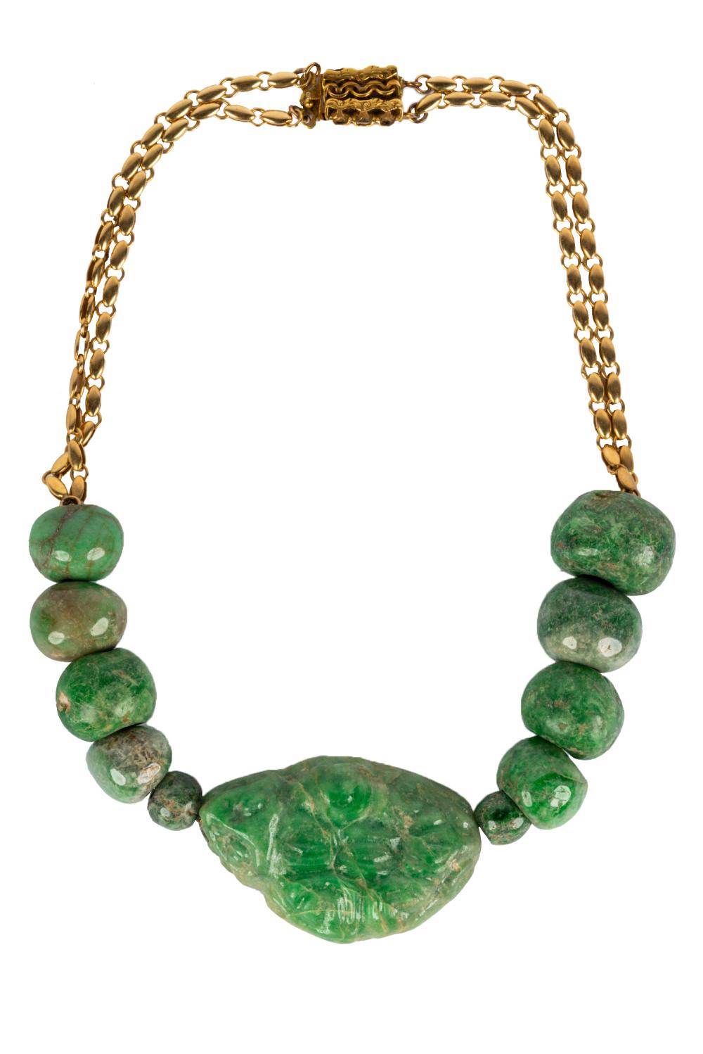 Appraisal: MAYAN JADE NECKLACEon a gold plate chain the central jade