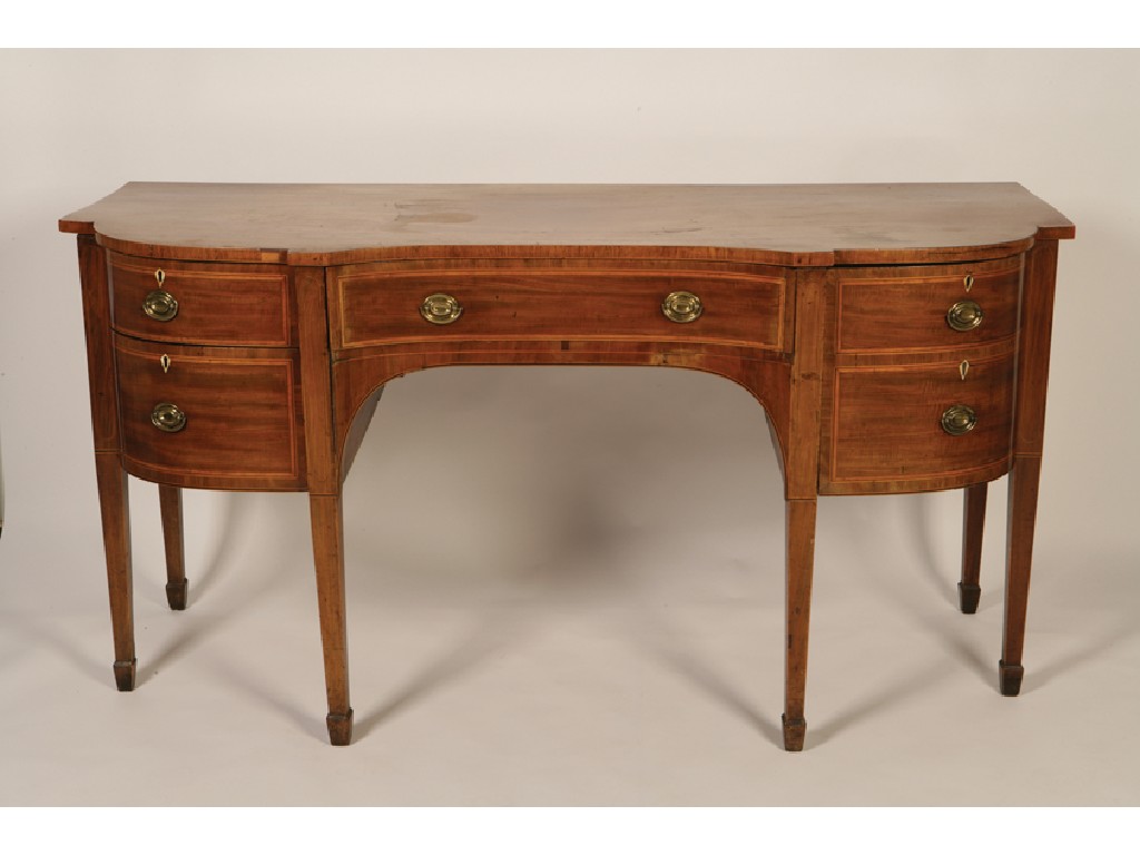 Appraisal: A GEORGE III MAHOGANY SIDE BOARD the shaped top above