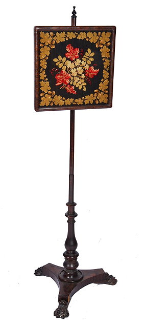 Appraisal: A WILLIAM IV ROSEWOOD POLE SCREEN the height adjustable banner