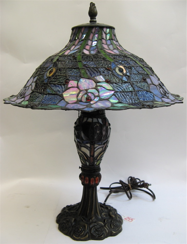 Appraisal: A DECORATIVE STAINED LEADED GLASS TABLE LAMP The D shade