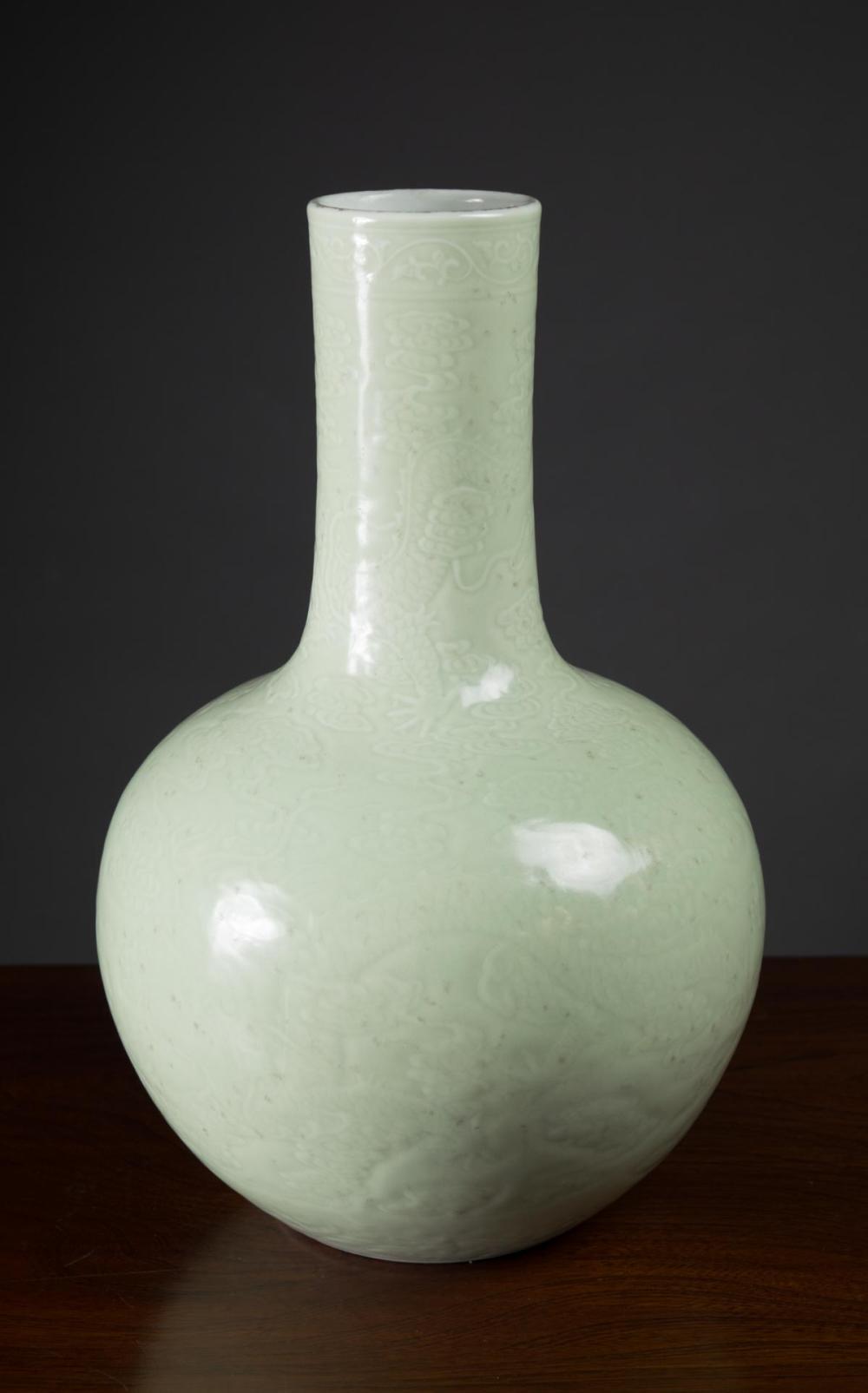 Appraisal: CHINESE PORCELAIN CELADON GLAZED VASE of bottle form with incised