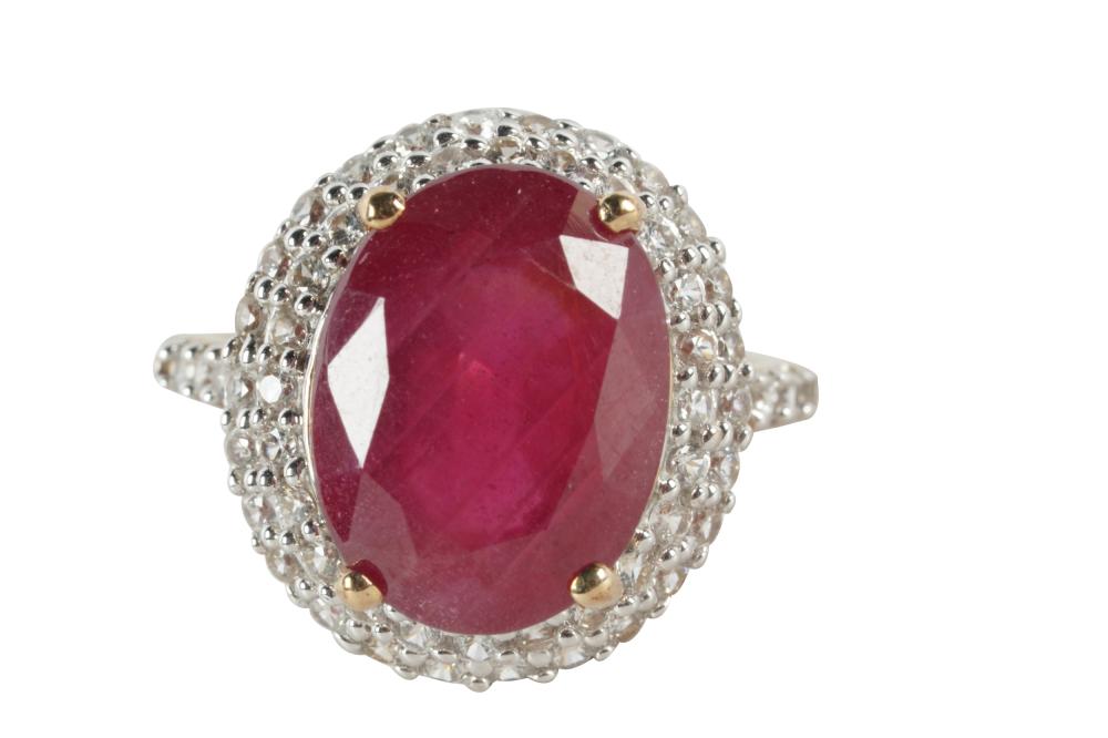 Appraisal: KARAT GOLD RUBY RINGcentering one oval glass-filled ruby weighing approximately