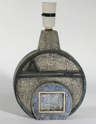 Appraisal: A Troika Pottery Wheel lamp moulded in low relief painted