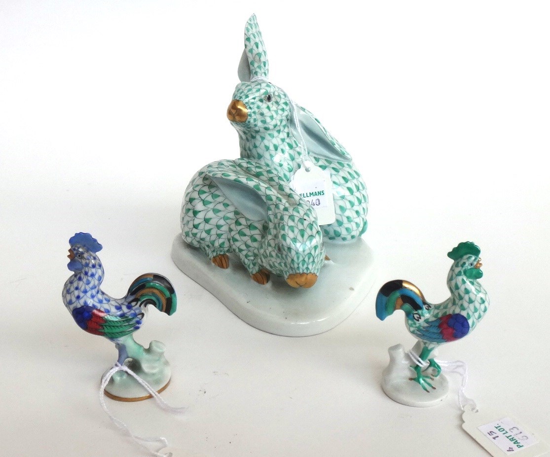 Appraisal: A Herend porcelain group modeled with two rabbits atop a