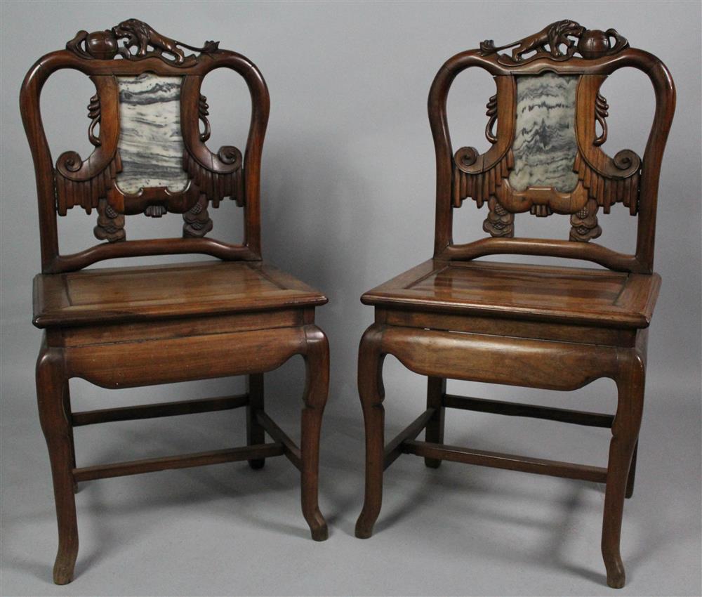 Appraisal: PAIR OF CHINESE MARBLE-INSET HARDWOOD SIDE CHAIRS the carved openwork